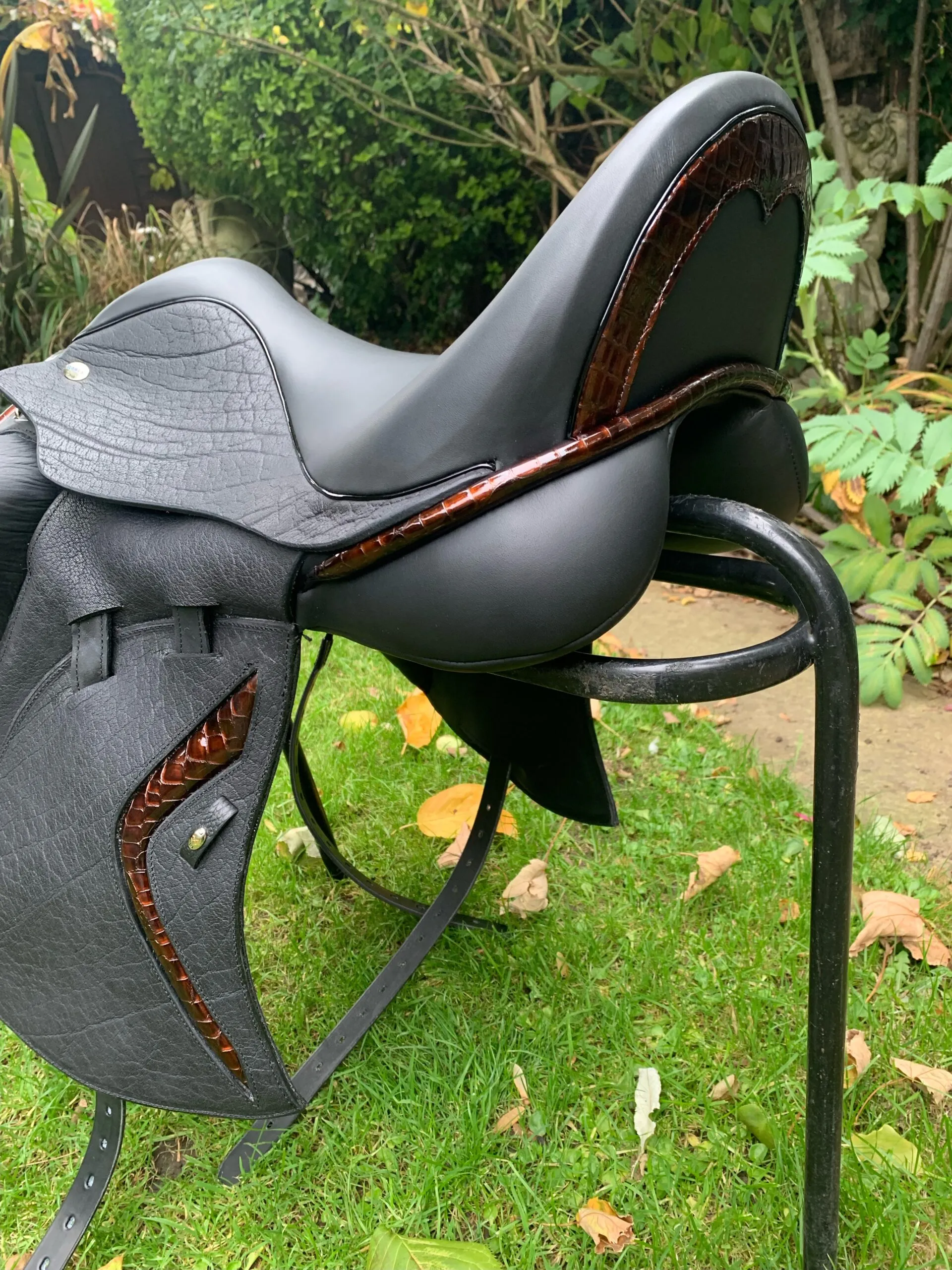 A bespoke IDEAL Iconix dressage saddle, made to order with hand-finished leather inlays